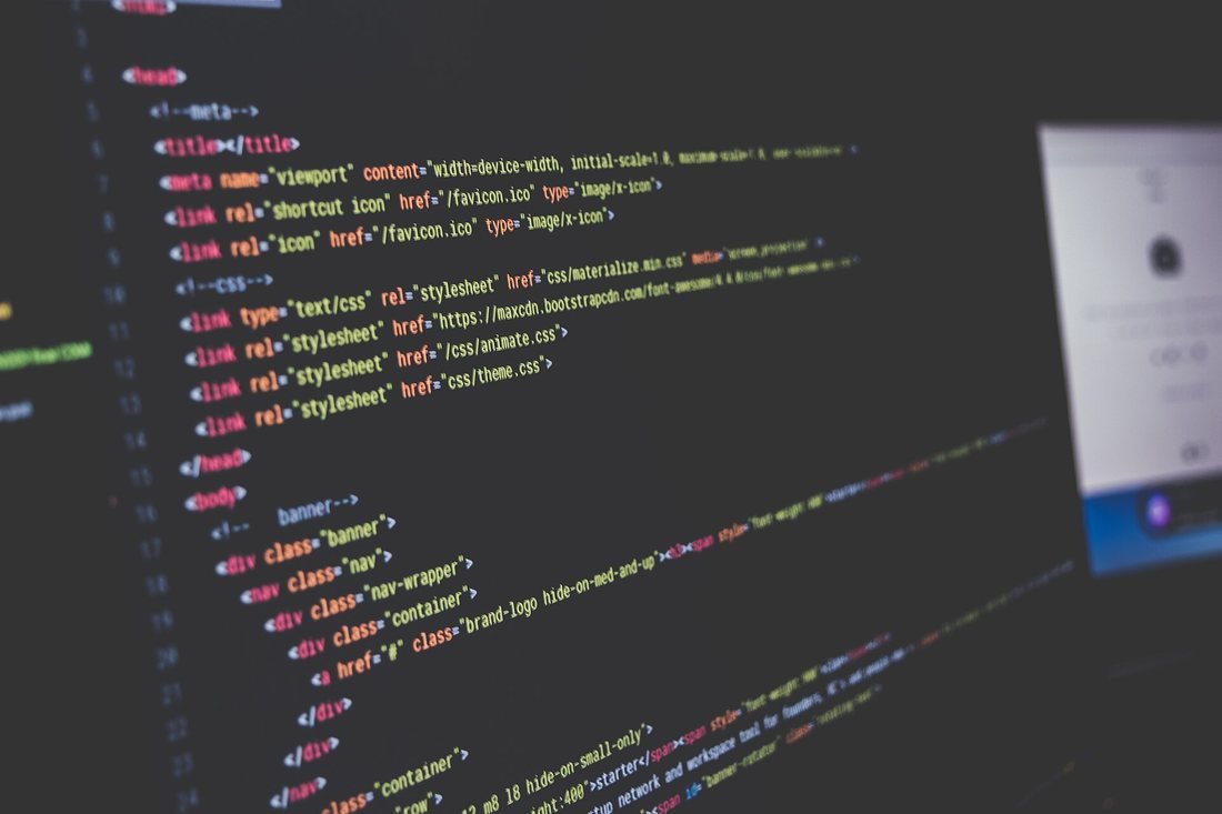 Lines of HTML source code on a dark editor screen