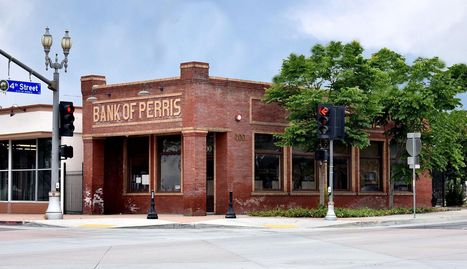 Sun City Marketing — Internet Marketing & Website Design, the historic Bank of Perris building on 4th Street in downtown Perris, CA