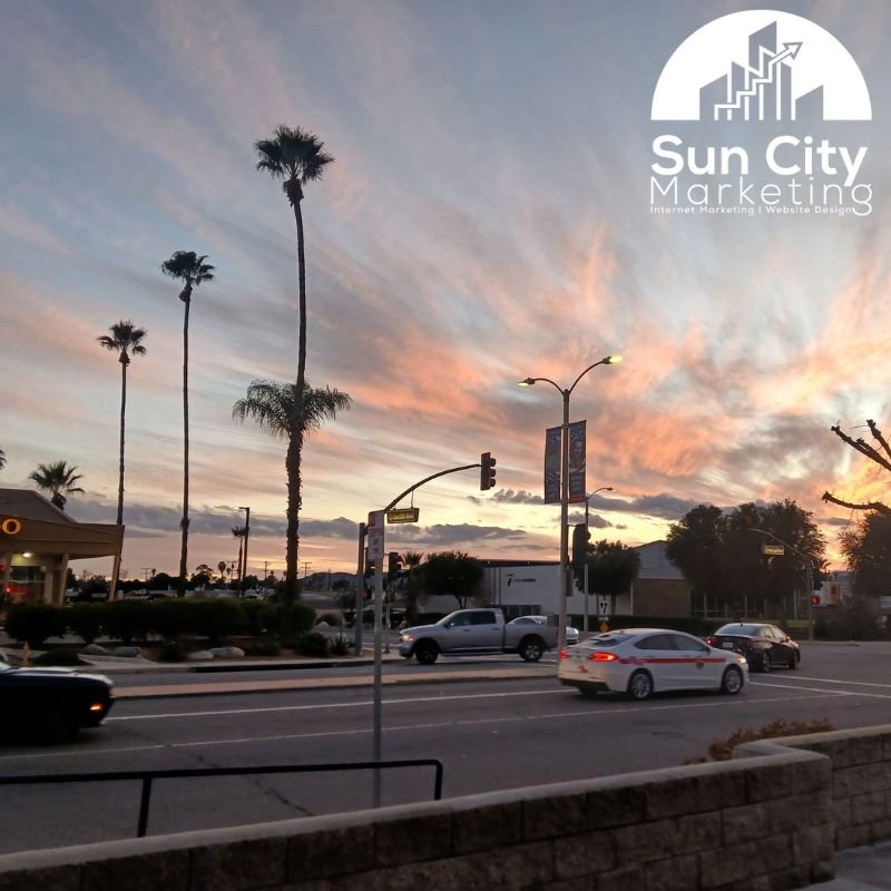 Sun City Marketing logo overlaid on a vibrant sunset view of McCall Blvd and Sun City Blvd in Menifee, CA, featuring local website design and internet marketing services.